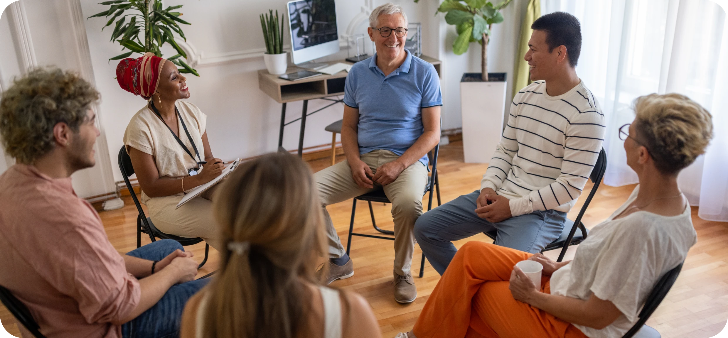 People discussing in a circle setting